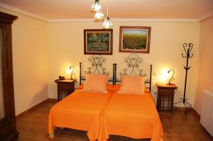 Postel nebo postele na pokoji v ubytování Hotel El Cortijo de Daimiel