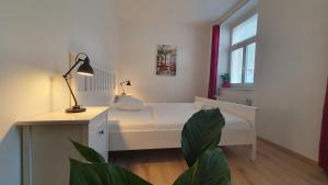 A bed or beds in a room at Le Monde Apartment Bratislava - amazing 5BDR in downtown