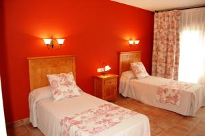 Postel nebo postele na pokoji v ubytování Hotel El Cortijo de Daimiel