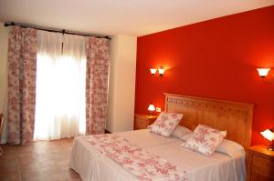 Postel nebo postele na pokoji v ubytování Hotel El Cortijo de Daimiel