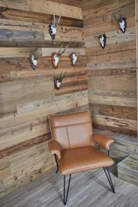 A seating area at Glemm Lodge Apartments - JOKER CARD im Sommer inklusive