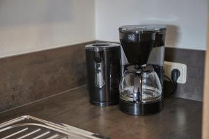 Coffee and tea making facilities at Glemm Lodge Apartments - JOKER CARD im Sommer inklusive
