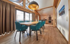 A seating area at Glemm Lodge Apartments - JOKER CARD im Sommer inklusive