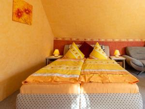 Ένα ή περισσότερα κρεβάτια σε δωμάτιο στο Ferienwohnung Familie Schmidt