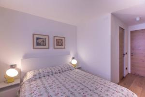 Posteľ alebo postele v izbe v ubytovaní JOIVY Warm Flat for 4, with Parking in Courmayeur