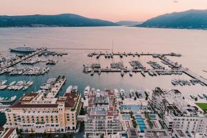 an aerial view of a marina with boats in the water at Regent Porto Montenegro & Residences in Tivat