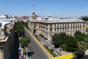 a view of a building in a city with a street at Liman Hotel Baku in Baku