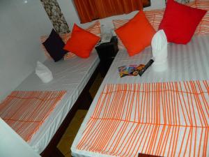 Rúm í herbergi á New London Hostel