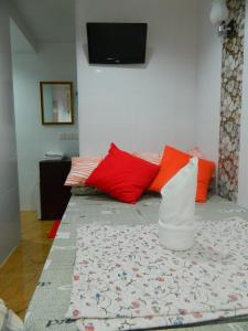 Rúm í herbergi á New London Hostel