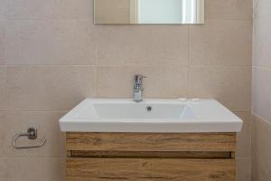 A bathroom at Chandris Apartments