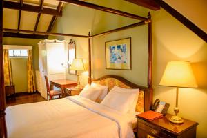 Ένα ή περισσότερα κρεβάτια σε δωμάτιο στο Windsor Golf Hotel & Country Club