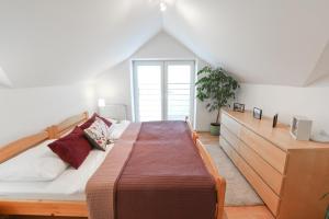Posteľ alebo postele v izbe v ubytovaní Penzion Modul