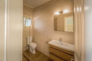 A bathroom at Chandris Apartments