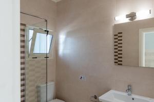 A bathroom at Chandris Apartments
