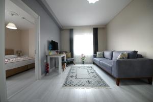 TV a/nebo společenská místnost v ubytování city59 Suit Otel