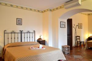 A bed or beds in a room at Il Castello