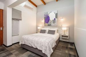 Postel nebo postele na pokoji v ubytování 202 Hotel Boutique