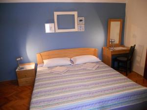 Postel nebo postele na pokoji v ubytování Room Dinko