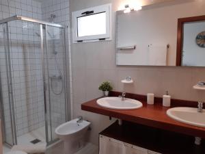 Koupelna v ubytování Apartamento Arena + 16 fotografií