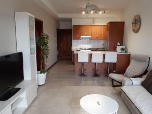 Kuchyň nebo kuchyňský kout v ubytování Apartamento Arena