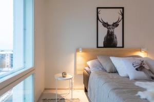 Postel nebo postele na pokoji v ubytování Tuomas´luxurious suites, Davvi