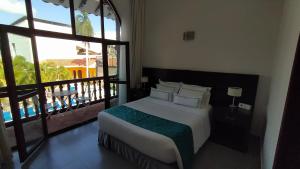 Ένα ή περισσότερα κρεβάτια σε δωμάτιο στο Hotel Union