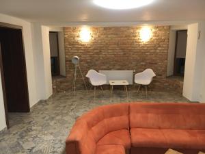 Posezení v ubytování Portus Apartment