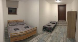Postel nebo postele na pokoji v ubytování Portus Apartment
