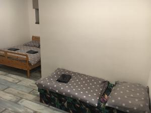 Postel nebo postele na pokoji v ubytování Portus Apartment