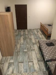 Postel nebo postele na pokoji v ubytování Portus Apartment