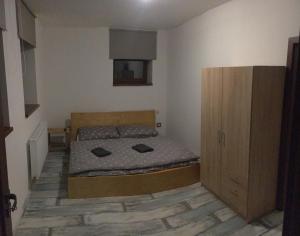 Postel nebo postele na pokoji v ubytování Portus Apartment