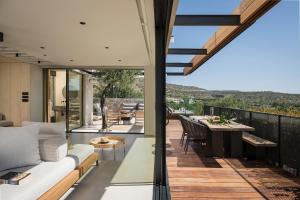 A balcony or terrace at OPENNESS House by the sea