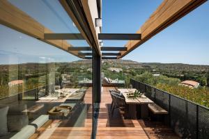 A balcony or terrace at OPENNESS House by the sea