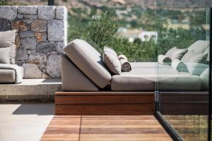 A seating area at OPENNESS House by the sea