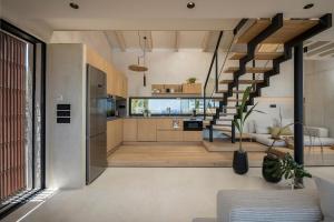 A kitchen or kitchenette at OPENNESS House by the sea
