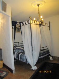 Postel nebo postele na pokoji v ubytování Château des Aiguilles