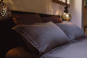 Postel nebo postele na pokoji v ubytování The Cozy Nest - Bellano