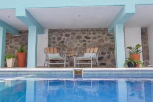 בריכת השחייה שנמצאת ב-Hotel Pura Chacala או באזור