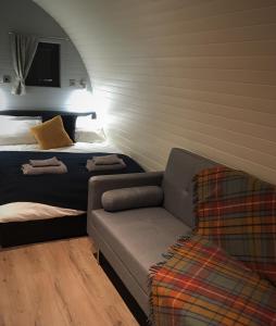 A seating area at Tomatin Glamping Pods