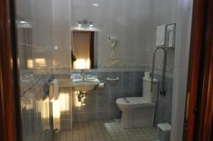 Ein Badezimmer in der Unterkunft Pension Alameda