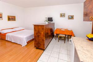 Postel nebo postele na pokoji v ubytování Apartments Tomislav
