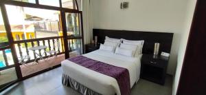 Ένα ή περισσότερα κρεβάτια σε δωμάτιο στο Hotel Union