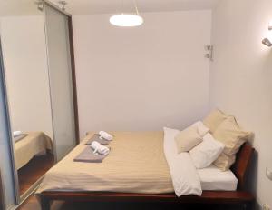 Postel nebo postele na pokoji v ubytování Warsaw Concierge Koszykowa