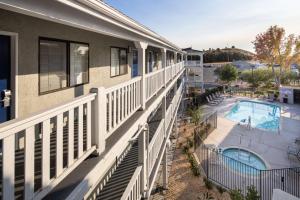an aerial view of a house with a swimming pool at SureStay Hotel by Best Western Fairfield Napa Valley in Fairfield