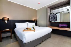 Postel nebo postele na pokoji v ubytování Best Western Ferrat