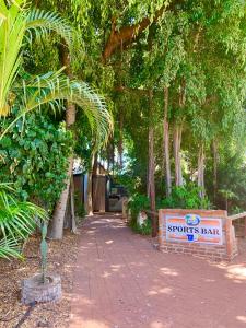 a sign for a sproutsettsettsettsettsettsettsettsettsearchearch at Roebuck Bay Hotel in Broome