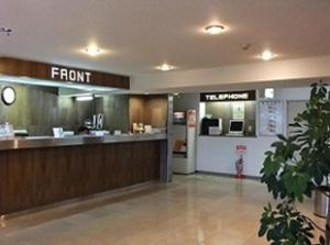 a store lobby with a front counter in a mall at Hotel Kiyoshi Nagoya No.1 in Nagoya