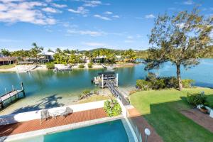 an aerial view of a lake with a dock at Pisces Apartment 5, Noosa Heads in Noosa Heads