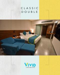 Postel nebo postele na pokoji v ubytování Vivid A Boutique Hotel