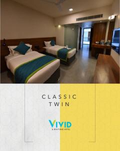 Postel nebo postele na pokoji v ubytování Vivid A Boutique Hotel